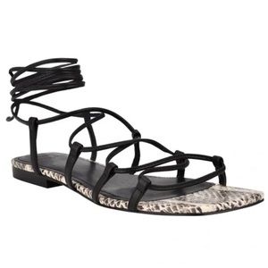 Lightly worn black sharpie gladiator Marc Fisher sandals